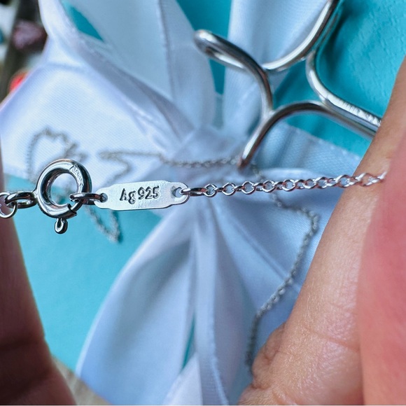 Tiffany & Co Infiniti Cross Necklace in Silver, 16” - Picture 6 of 6